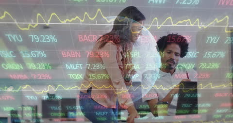 Business Team Analyzing Stock Market Data in Office