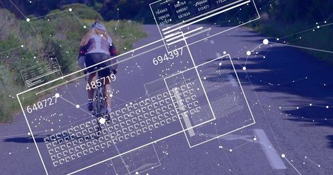 Cyclist on Country Road with Digital Data Overlay