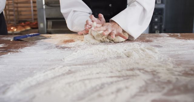 Baker Kneading Dough on Flour-Covered Table - Download Free Stock Images Pikwizard.com