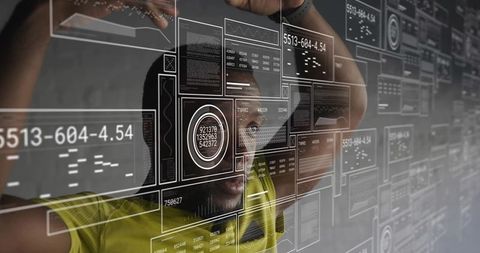 Man interacting with transparent hud using gestures for data visualization and analytics