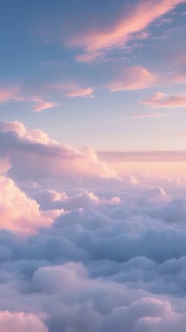 Vertical aerial video drifting pink clouds over endless dawn cloudscape