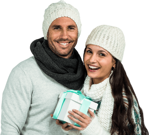 Joyful Couple Presenting Gift in Winter Outfits with Transparent Background