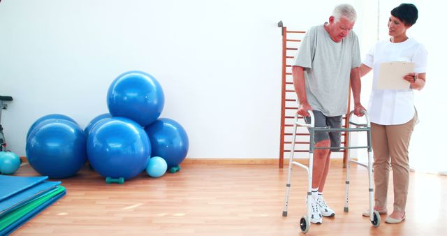 Elderly Man Receiving Physical Therapy with a Walker - Download Free Stock Images Pikwizard.com