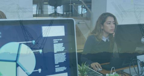 Woman Analyzing Business Data with Digital Overlay Effects