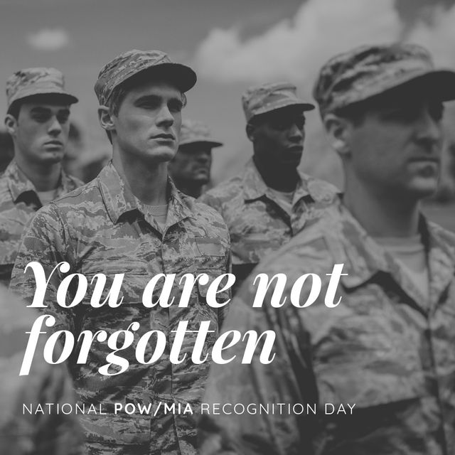 Multiracial group of soldiers standing in formation, commemorating National POW/MIA Recognition Day. Useful for articles or posts about military service, recognition of veterans, events honoring prisoners of war and missing in action, or promoting awareness on veteran issues.