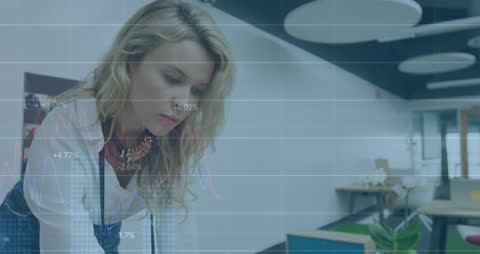 Businesswoman Analyzing Data in Modern Office