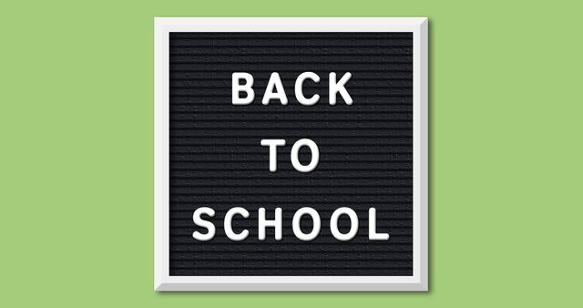 Back to School Blackboard Message on Green Background - Download Free Stock Images Pikwizard.com