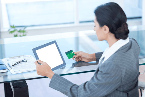 businesswoman with transparent tablet and credit card in modern office - Download Free Stock Videos Pikwizard.com