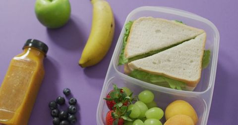 Healthy Vegan Packed Lunch with Fresh Fruits and Vegetables