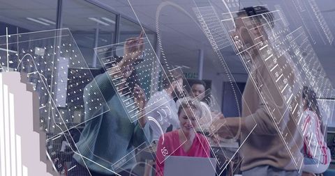 Team collaborating and visualizing holographic data, charts and analytics in modern office