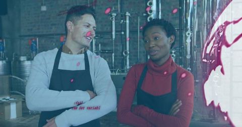 Team of Brewers Discussing Work Process in Industrial Brewery