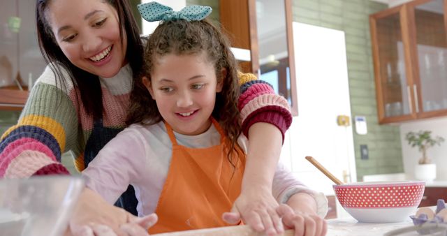 Mother and Daughter Baking Together in Kitchen Spreading Dough - Download Free Stock Images Pikwizard.com