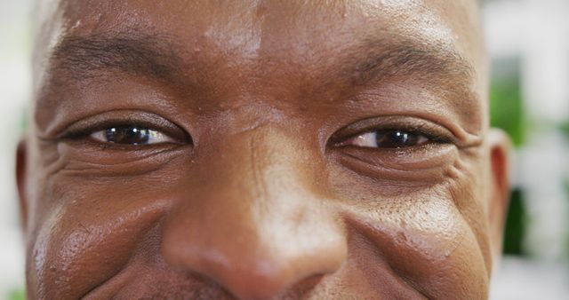 Close-Up of African American Man Smiling with Joyful Expression - Download Free Stock Images Pikwizard.com