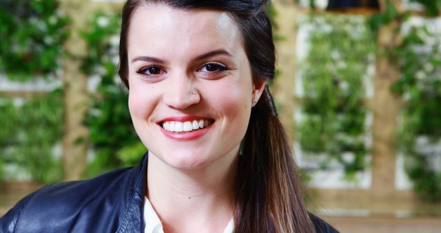 Smiling Woman with Nose Piercing in Casual Outdoor Environment - Download Free Stock Images Pikwizard.com