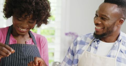 Happy Couple Cooking Together in Kitchen with Sunny Atmosphere - Download Free Stock Images Pikwizard.com