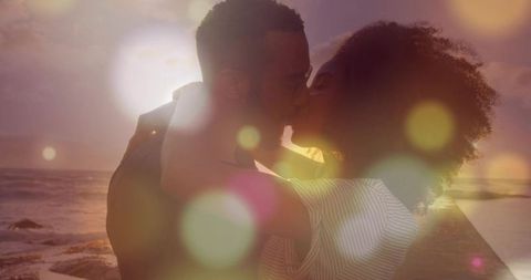 Romantic Couple Kissing at Sunset on Pier
