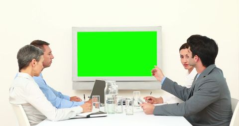 Team Meeting with Interactive Green Screen Monitor