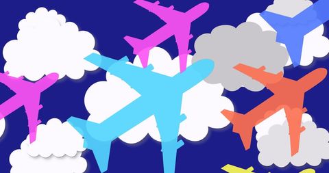 Colorful Airplanes Flying Surrounded by Clouds