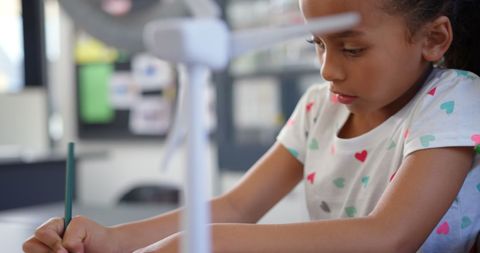 Focused student engaged in classroom activity