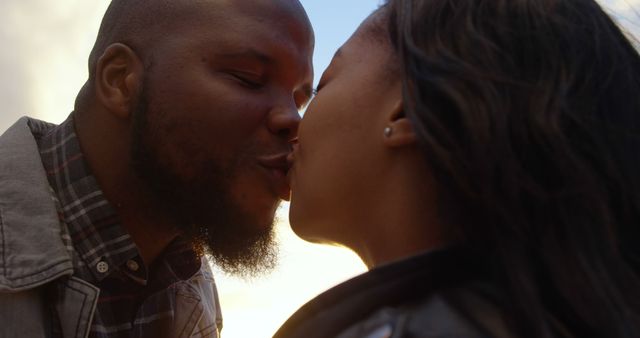 Close-up of couple kissing each other on a sunny day. Smiling happy couple 4k