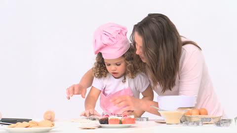 Mother and Daughter Baking Together with Joy and Teamwork