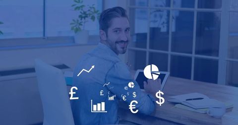 Smiling Man in Office Analyzing Financial Trends on Tablet