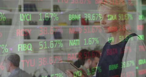 businesswoman analyzing data with financial charts overlay - Download Free Stock Images Pikwizard.com