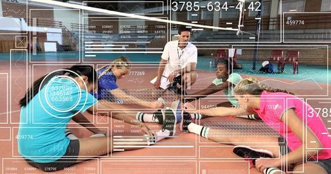 Girls volleyball team stretching with coach on gym court with digital analytics overlay