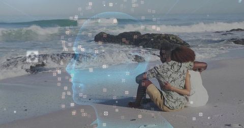 Couple Relaxing on a Beach with Digital Head Overlay