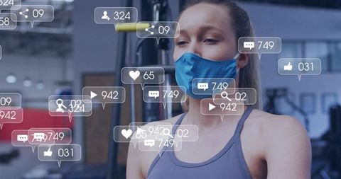 Masked woman exercising on weight machine with social media icons overlaying workout