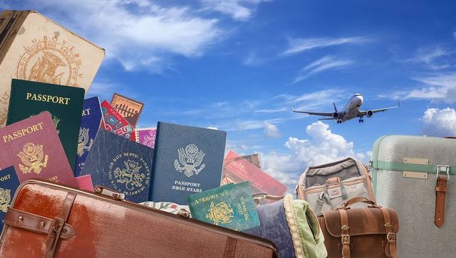 Passports and luggage piling by runway with airplane landing overhead for global travel marketing