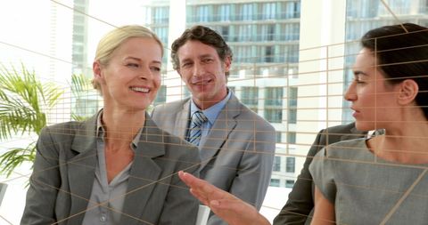 Diverse Business Team Engaging in Modern Office Setting