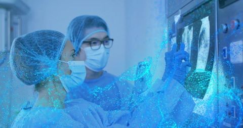 Doctors analyzing radiology scans with advanced technology effects