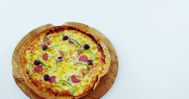Freshly Baked Pizza with Variety of Toppings on Wooden Board - Download Free Stock Images Pikwizard.com