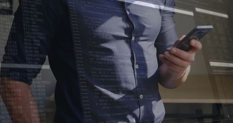 tech savvy professional reading code on smartphone - Download Free Stock Images Pikwizard.com