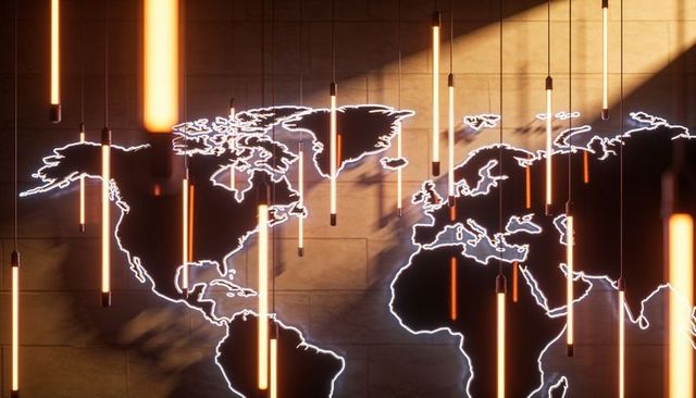 Neon world map outline with warm hanging tube lights for modern global technology spaces