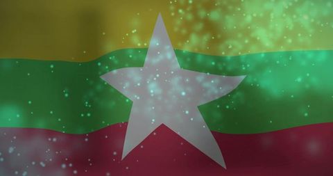 Waving myanmar tricolor flag with glowing cyan particles and central five-pointed star