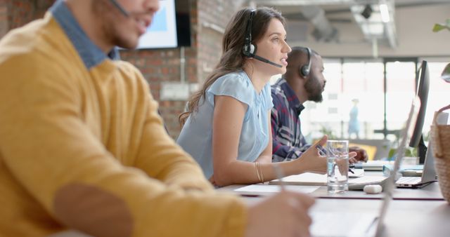 Customer Service Representatives Wearing Headsets in Modern Office - Download Free Stock Images Pikwizard.com