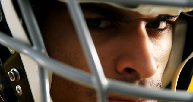 Focused American Football Player Wearing Helmet Close-Up - Download Free Stock Images Pikwizard.com