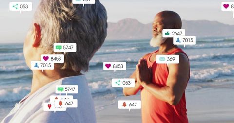 Senior man praying on beach with social media notifications floating, mindfulness balance