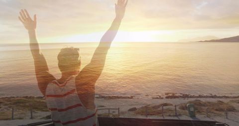 Woman Celebrating Life on Sunset Beach Scenic View