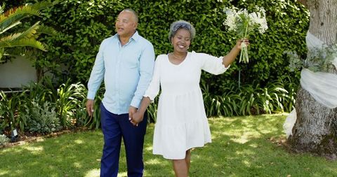 Happy Senior Couple Celebrating Garden Wedding Ceremony
