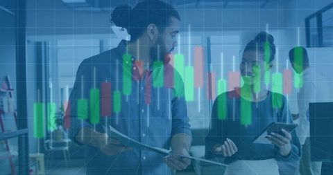 Colleagues in Modern Office Discussing Stock Market Trends