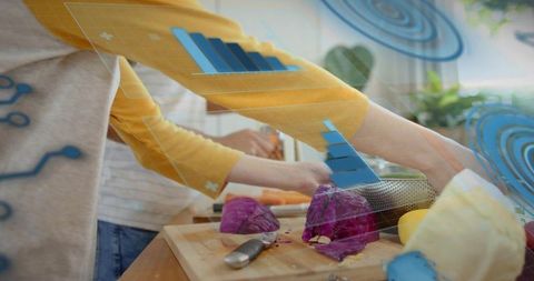 Couple chopping vegetables using augmented reality overlays for meal prep and nutrition