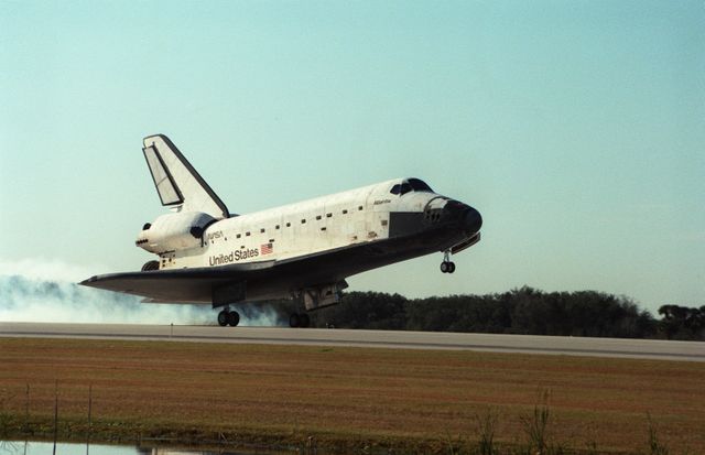 Space Shuttle Atlantis Landing at Kennedy Space Center After Mission STS-81 - Download Free Stock Photos Pikwizard.com
