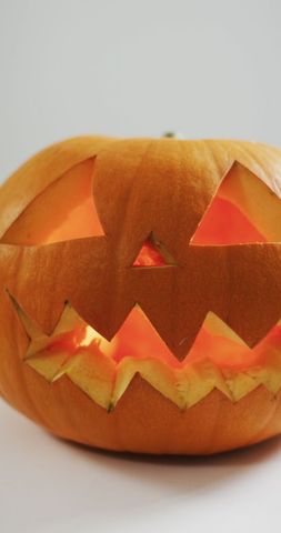 Close Up of Spooky Carved Halloween Pumpkin with Fierce Expression - Download Free Stock Images Pikwizard.com