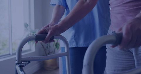 Caregiver Assisting Senior with Walker at Home