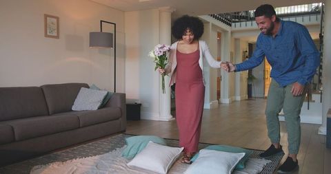 Happy Diverse Couple Enjoying Quality Time at Cozy Home