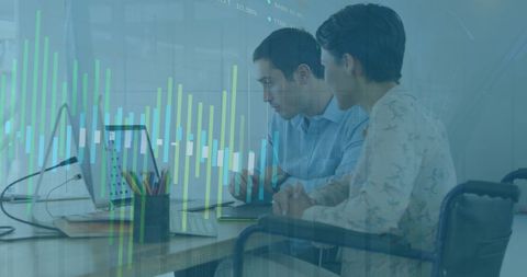 Diverse Professionals Analyzing Financial Data on Computers