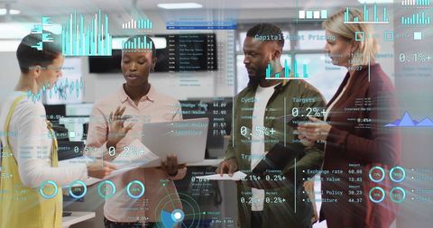 Diverse team analyzing financial data in modern office environment